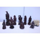 A selection of assorted hand carved Oriental figures a/f