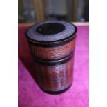 A Chinese carved circular box and lid finely carved in hardwood