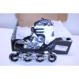 A new pair of inline skates child's size 12