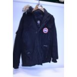 A Canada Goose jacket size XL (worn)
