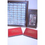 A selection of vintage cigarette card albums and framed cigarette cards, shipping unavailable
