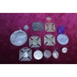 A selection of assorted medals and badges etc