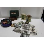 A job lot of vintage tins and other items