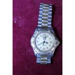 A vintage TAG Huer professional watch in stainless steel strap in working order