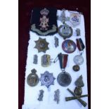 A job lot of military related badges and patches