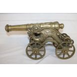 A heavy brass canon with dragon decoration L40cm