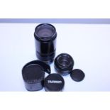 Three assorted camera lenses including Tamron and Yashica