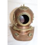 A novelty copper and brass divers helmet