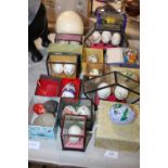 A large selection of hand painted and cased eggs and other assorted eggs