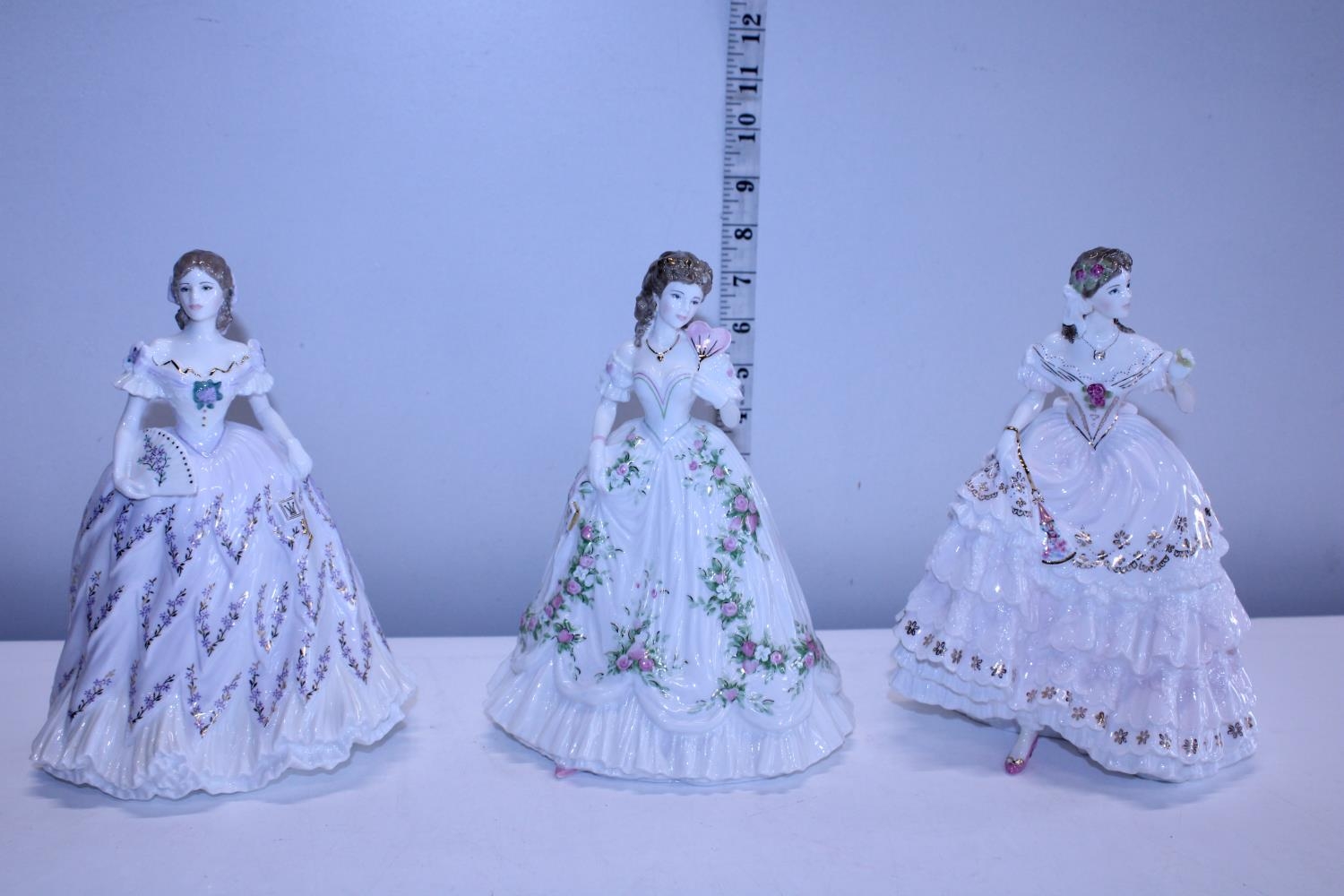 Three Royal Worcester ltd edition lady figures