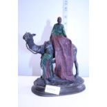 A Austrian signed cold painted bronze by Carl Kauba 'Carpet Seller'
