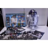 A Deagostini 'Build your Own' R2-D2 model complete with magazines