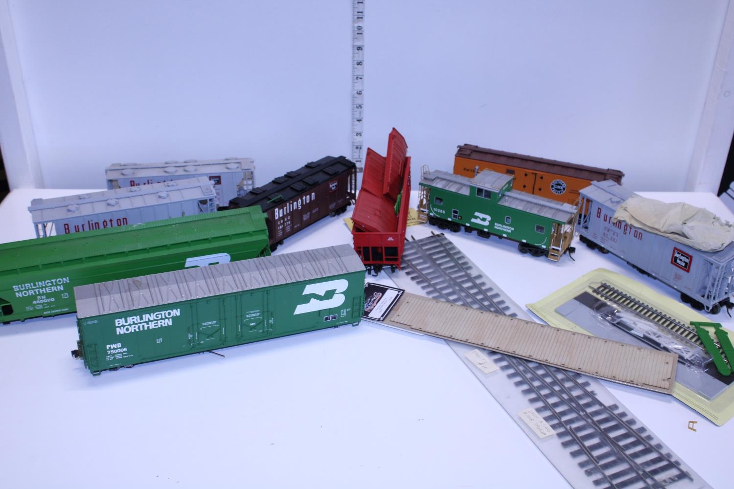 A selection of O gauge wagons and accessories