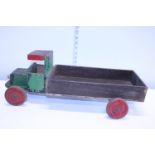 A vintage Child's pull-a-long wooden truck