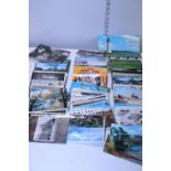 A job lot of assorted postcards