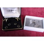 A pair hallmarked sterling silver earrings and a costume cufflink and stud set