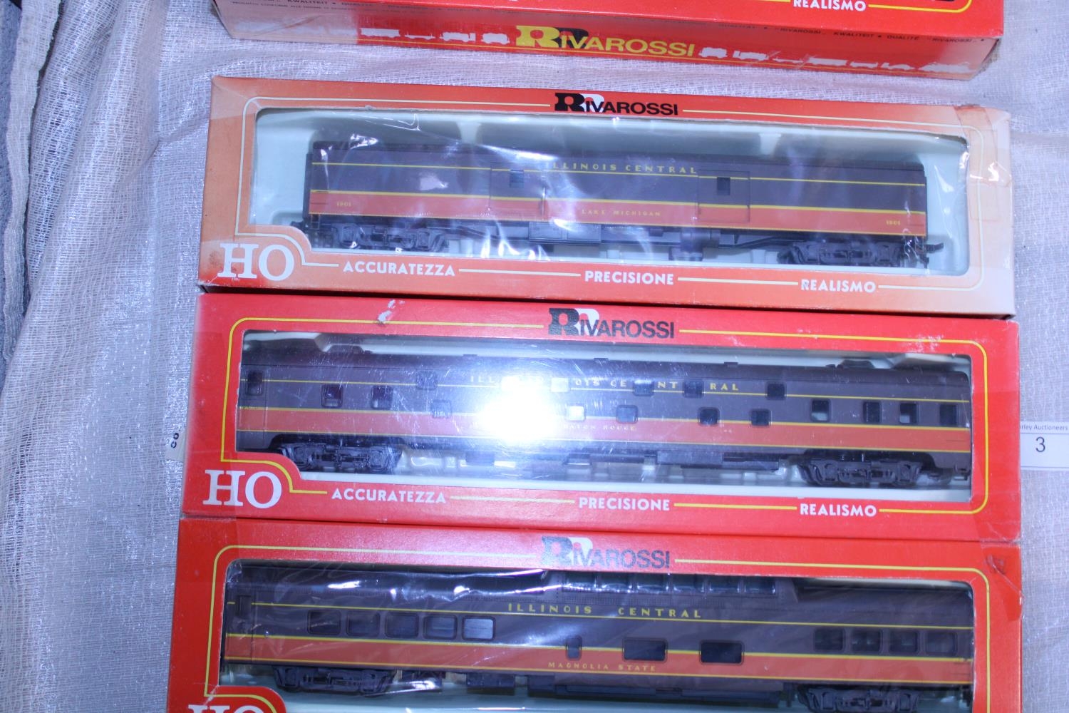 A Rivarossi HO gauge locomotive and two carriages