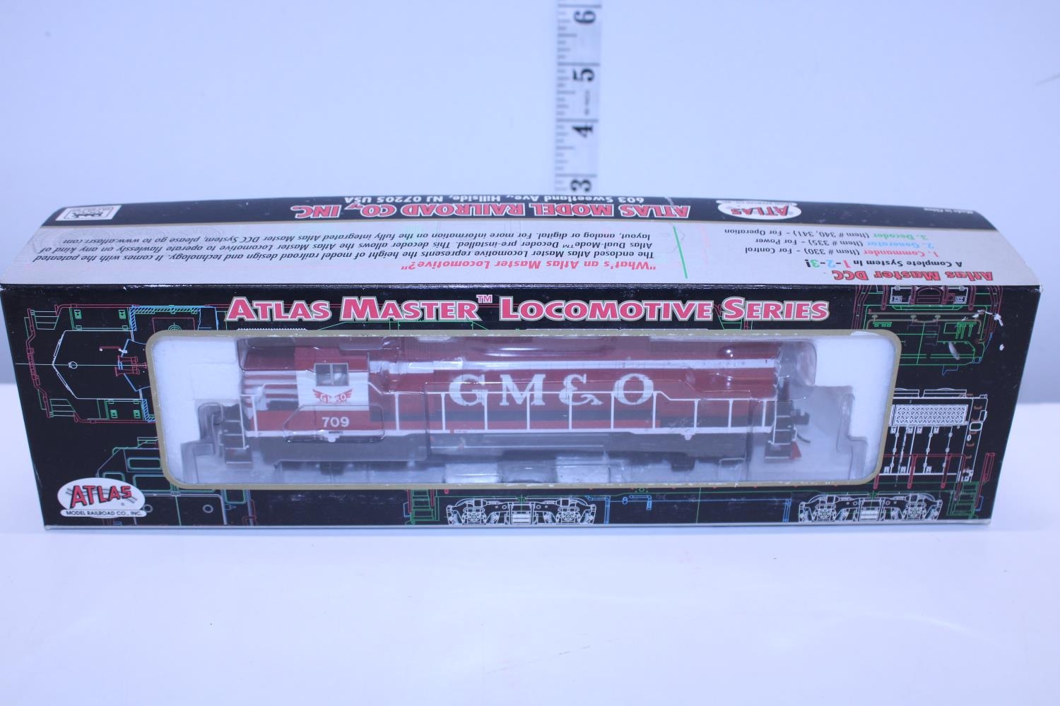 A boxed atlas master HO gauge locomotive GP38