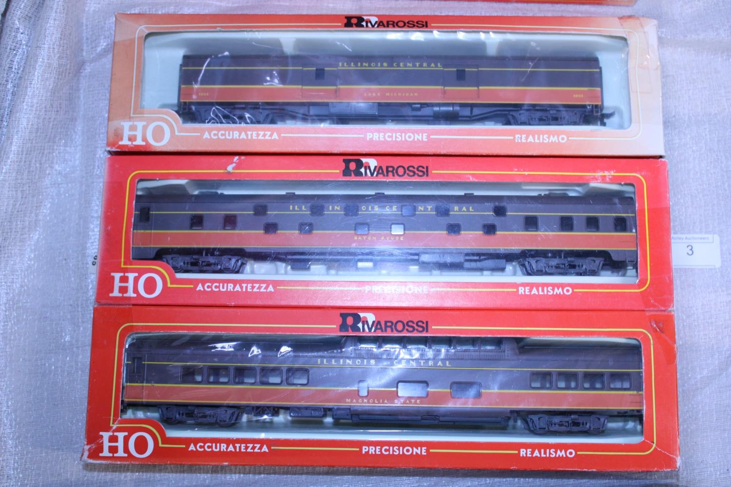 A Rivarossi HO gauge locomotive and two carriages