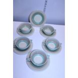 A selection of Susie Cooper 'Wedding Band' Soup bowls and saucers