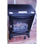 A electric log burner effect fire (untested). Shipping unavailable.