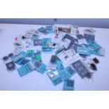 A box of new O gauge model railway accessories