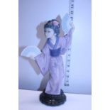 A Lladro figurine signed and dated to the base