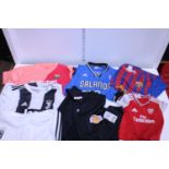 A selection of assorted sports shirts various sizes