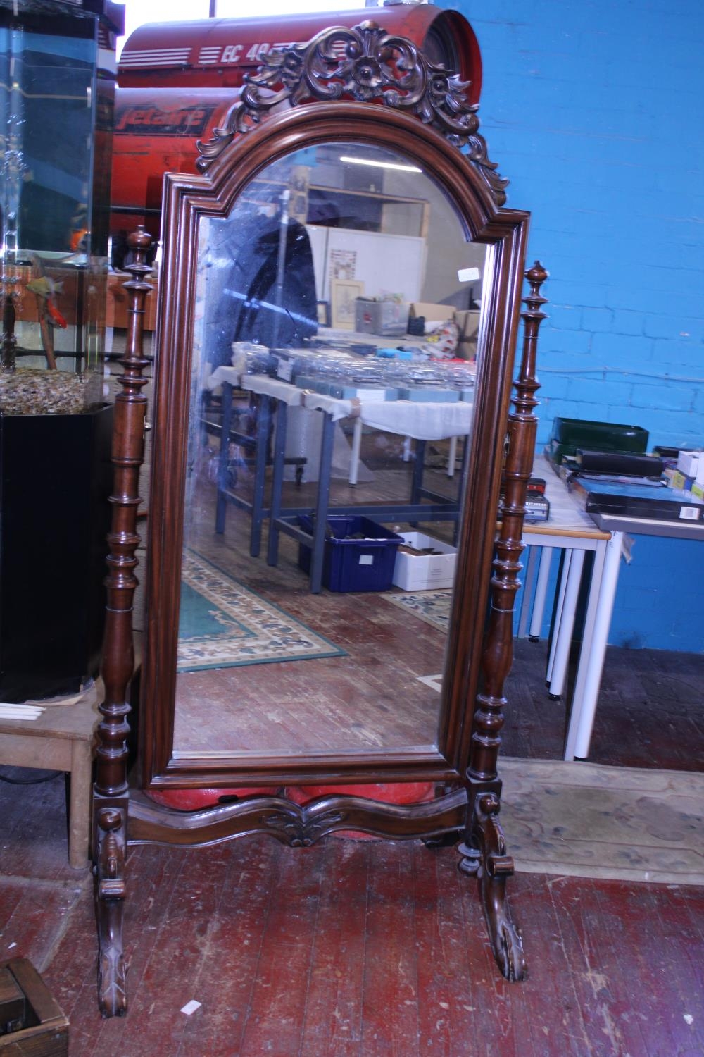 A large mahogany antique chevalier mirror (with replacement glass, slight damage to freeze)