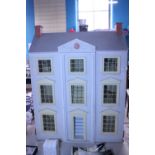 A large vintage dolls house. Shipping unavailable.