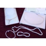 A selection of boxed costume jewellery including pearls and other