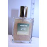 A bottle of Tom Ford shimmering body oil