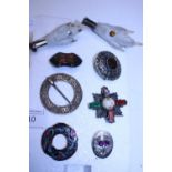 A selection of Scottish/Celtic style brooches