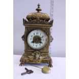 A late 20th century French gilt mantle clock by S. Marts with enamel dial (slight crack to one