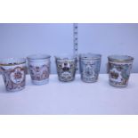 Five assorted antique enamelled Commemorative beakers