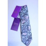 A new gentleman's tie with tags from 'Liberty's of London'