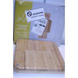 A boxed compact bamboo cheeseboard set, as new however one ramekin damaged inside packaging