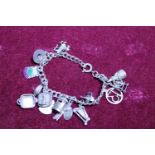 A Sterling silver bracelet & charms