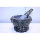 A heavy granite pestle & mortar, shipping unavailable