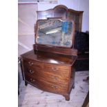 A quality vintage mahogany bow fronted two over two drawer dressing table with swivel mirror, approx