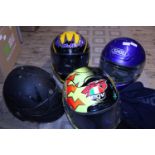 Four assorted crash helmets