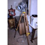 A vintage theatre lamp mounted on tripod in working order, shipping unavailable