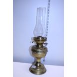 A brass oil lamp & glass chimney, , shipping unavailable