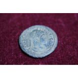 A Roman coin, Spink 734 Providentiae casess, gateway to military camp PLON in EX RIC 295