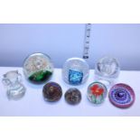 A selection of assorted paperweights