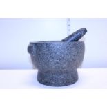 A heavy granite pestle & mortar, shipping unavailable