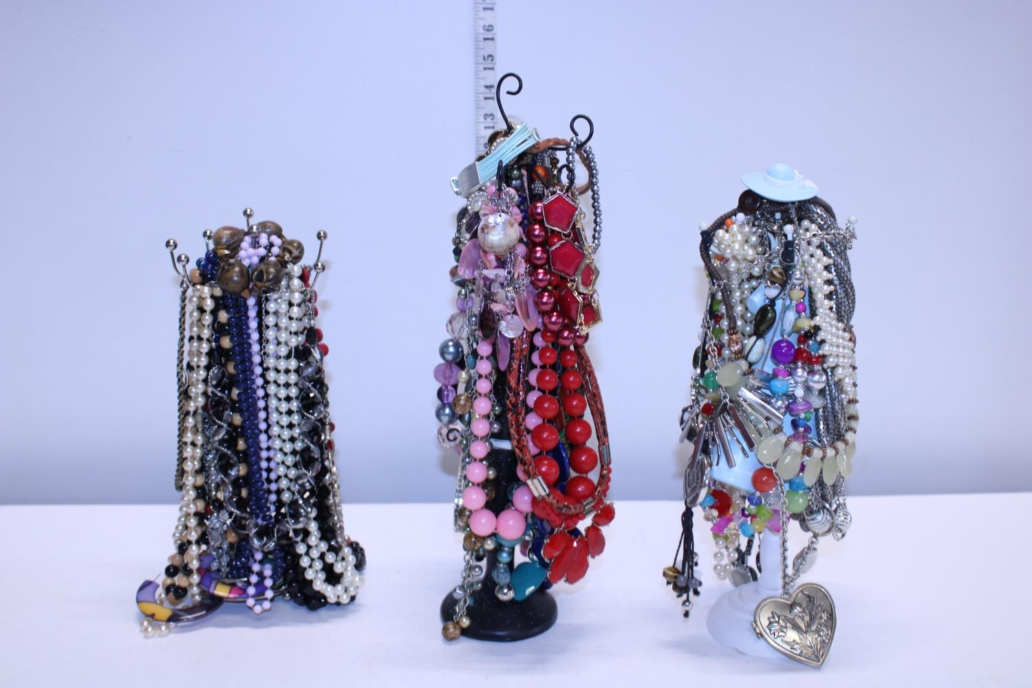 A good selection of costume jewellery including stands