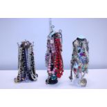 A good selection of costume jewellery including stands