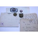 A selection of WW2 German military related badges & ephemera