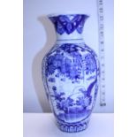 A hand decorated pearl glazed Oriental vase